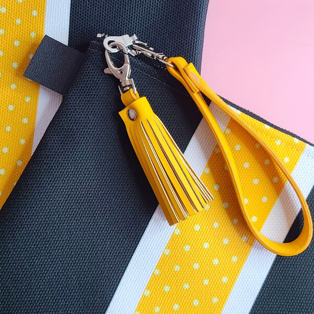 Canvas zipper pouch with yellow accent